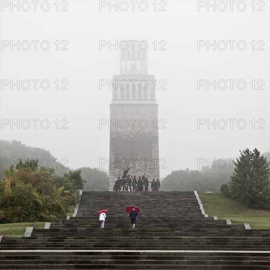 Stairs to the group of figures by Fritz Cremer with the bell tower