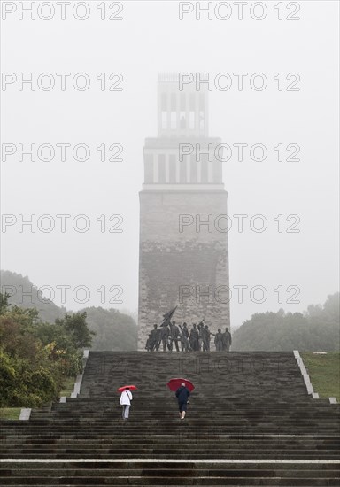 Stairs to the group of figures by Fritz Cremer with the bell tower