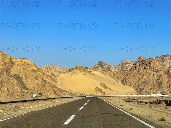 Car driving in the sunshine on the Sharm el-Sheikh Dahab road
