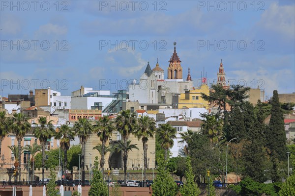 View of cityscape with Puerta de Palmas of Badajoz