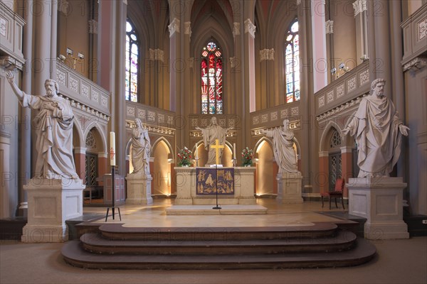 Altar room with four evangelists and Jesus statue