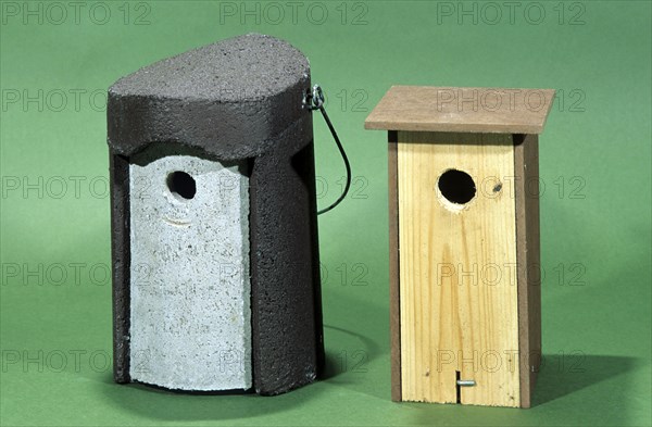 Two different nestboxes for small garden birds like great tits