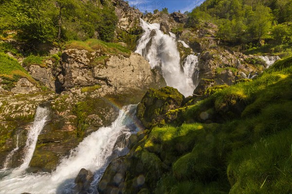 Waterfall in the valley of the Briksdalsbreen