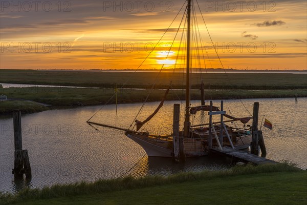 Sunrise with sailing ship at Suederhafen