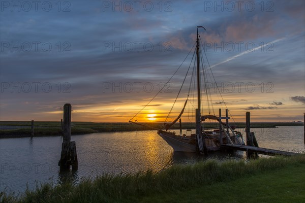 Sunrise with sailing ship at Suederhafen