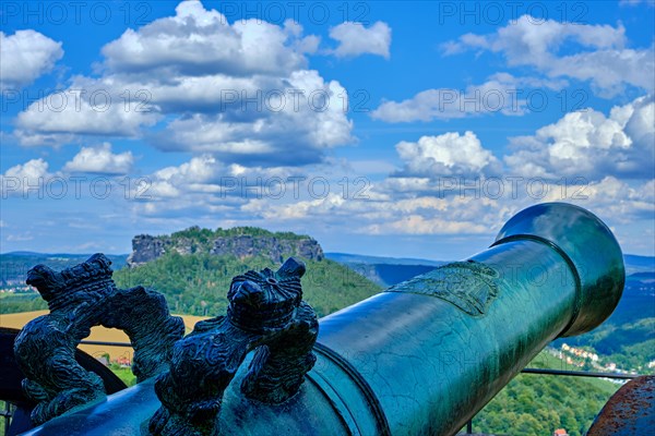Historical cannon on the parapet and view across to the Lilienstein