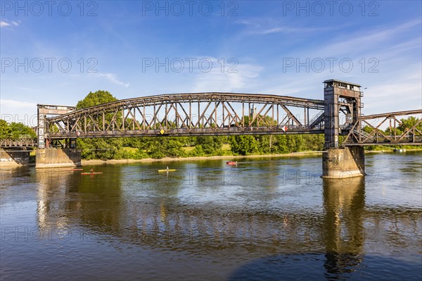 Canoeists under the lift bridge on the Elbe