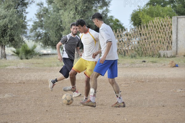 Men playing football