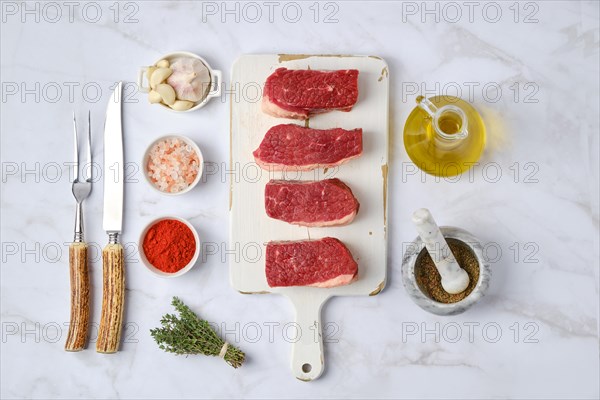 Top view of raw beef brisket flat steak with spice ready for cooking