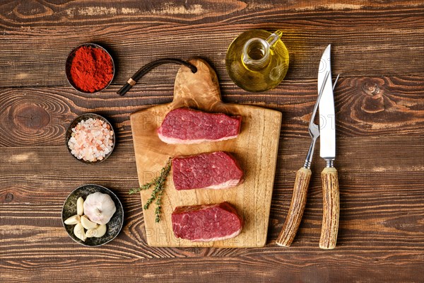 Top view of raw beef brisket flat steak with spice