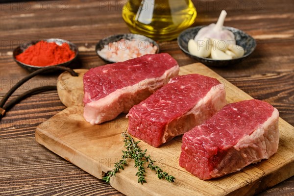 Raw eye of round beef steak