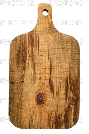 Old and scratched wooden cutting board isolated on white background