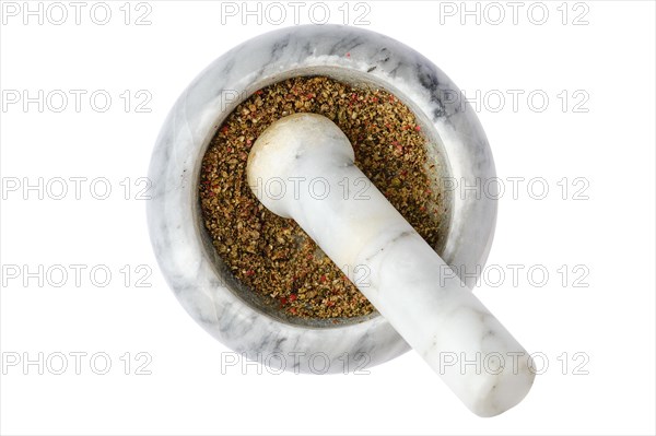 Top view of mortar with assortment of pepper