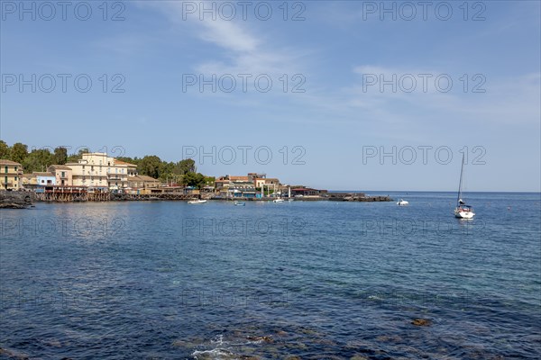 View of the fishing village of Capo Mulini