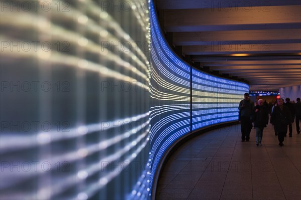 Passers-by in underground passage Passerelle