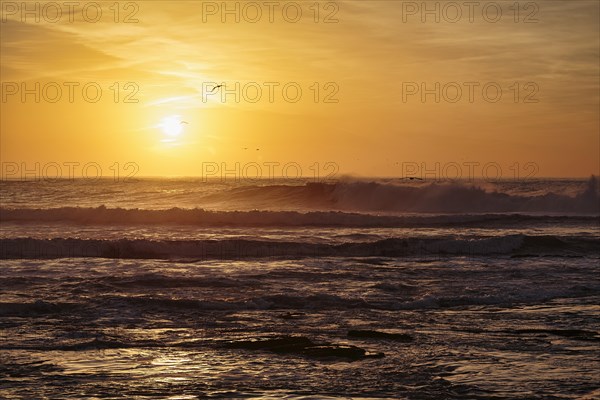 Waves at sunset on the Atlantic Ocean