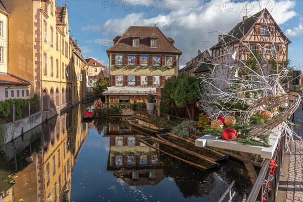 Little Venice with street decorations during Christmas time in the town of Colmar. Alsace
