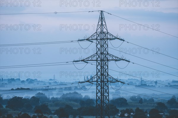 Electricity grid post during sunrise in the province of Gerona north of Catalonia Spain