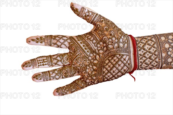 Hindu brides hand painted with henna