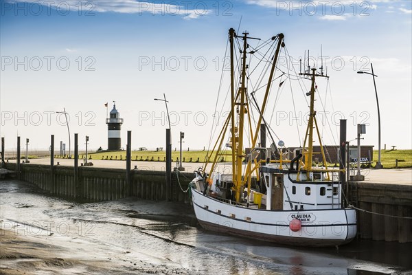 Black and white lighthouse and crab cutter