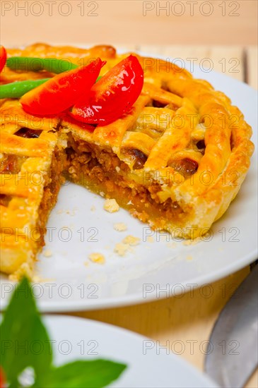 Fresh baked home made beef pie macro closeup