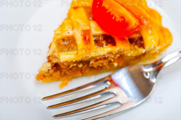 Fresh baked home made beef pie macro closeup