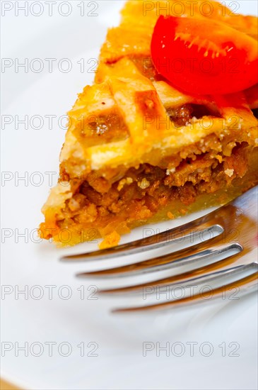 Fresh baked home made beef pie macro closeup