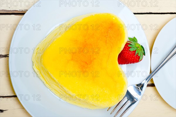 Heart shaped cheesecake with strawberryes ideal cake for valentine day