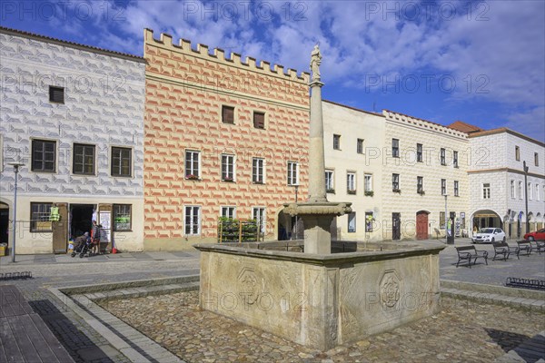 Historical houses and fountains on the main square of