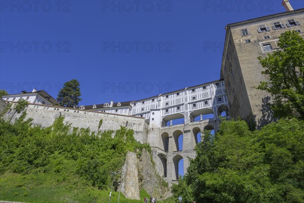 View up to the castle with historical bridge Plastovy most