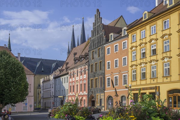 Historic houses on the main square and church towers of St. Nicholas and St. Elisabeth Church