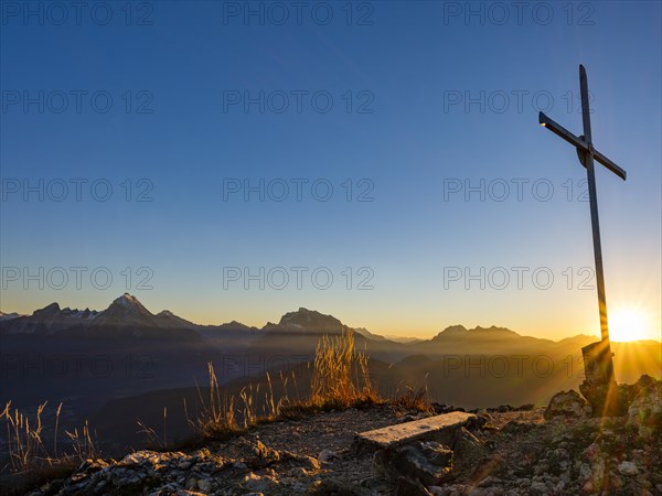 Rauher Kopf summit cross at sunset