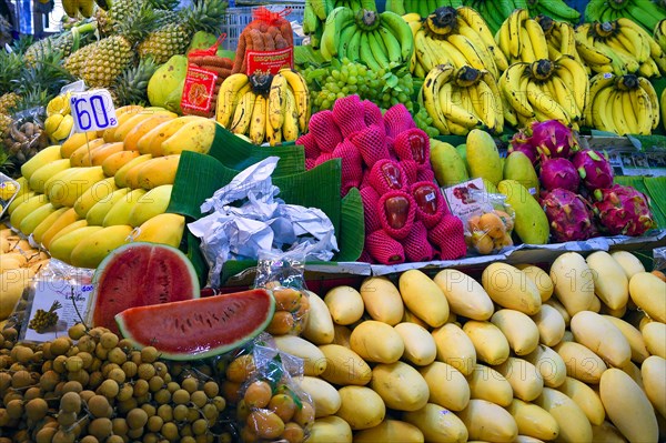 Typical stalls with huge selection of fresh fruits and vegetables at Banzaan fresh market