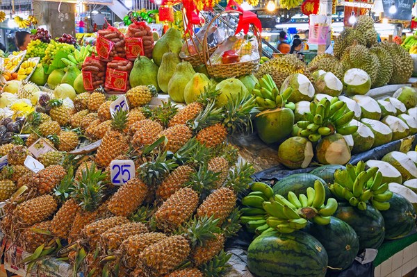 Typical stalls with huge selection of fresh fruits and vegetables at Banzaan fresh market