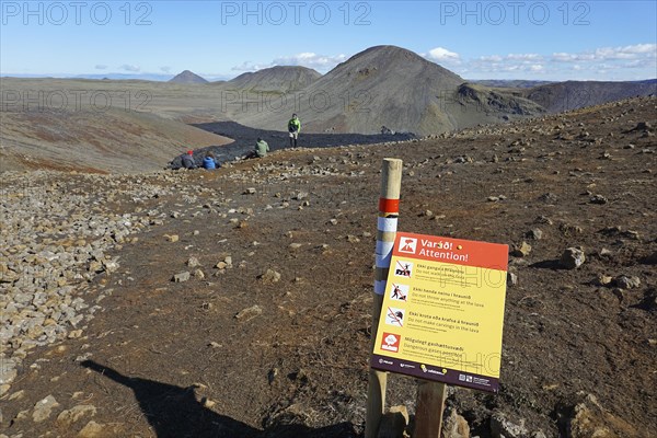 Warning sign near lava field