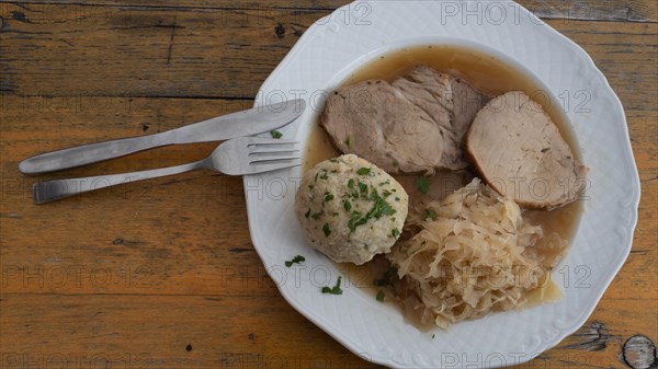 Roast pork with sauerkraut and dumplings