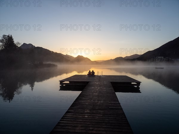 People enjoying the morning atmosphere at sunrise