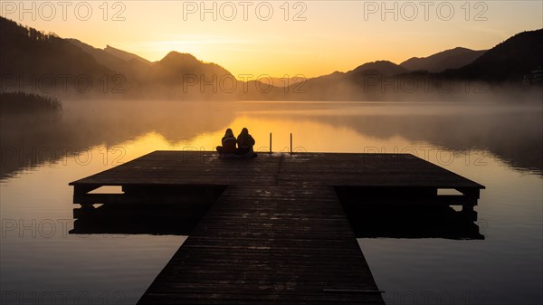 People enjoying the morning atmosphere at sunrise