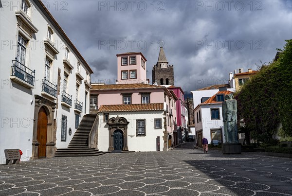 Small square in the old town with colourful houses and chapel Capela de Santo Antonio de Mouraria