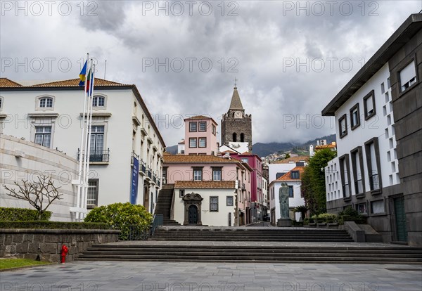 Small square in the old town with colourful houses and chapel Capela de Santo Antonio de Mouraria