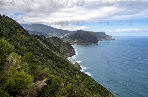 View of steep rocky coast and sea