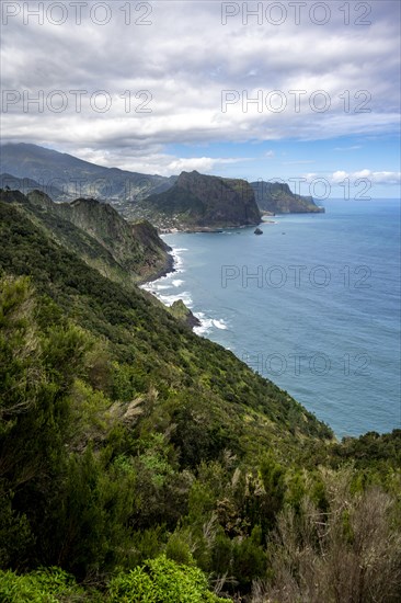 View of steep rocky coast and sea