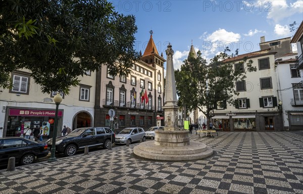 Square with mosaic floor and fountain in the old town