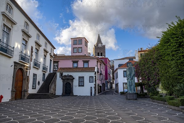 Small square in the old town with colourful houses and chapel Capela de Santo Antonio de Mouraria