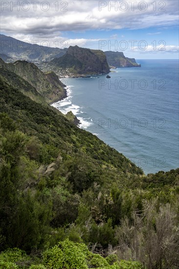 View of steep rocky coast and sea