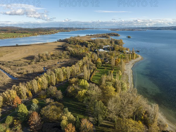 View over the autumnal Mettnau Park with the lido on the Mettnau peninsula in western Lake Constance