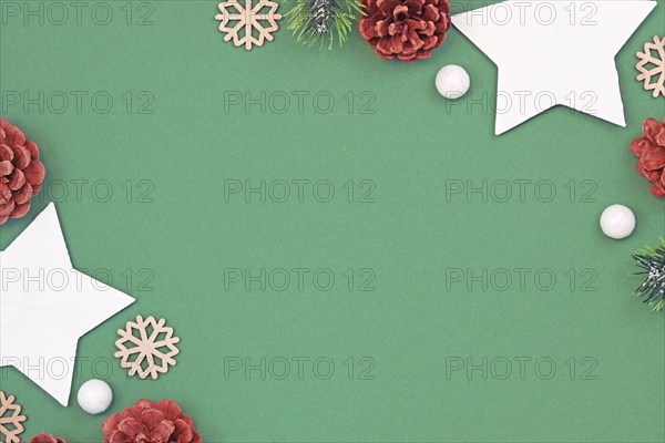 Christmas flat lay background with seasonal white paper stars