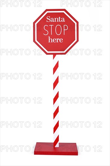 Red Christmas sign with text 'Santa Stop here' on white background