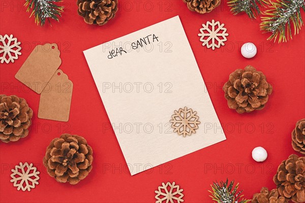 Seasonal Christmas holiday flat lay with concept for children letter to Santa Claus with white empty letter