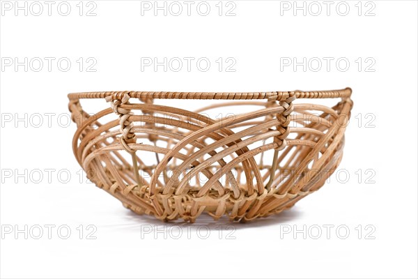 Single wooden basket bowl on white background